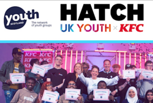 A header with Youth Scotland, UK Youth and KFC's logos. Beneath a delighted group hold up their certificates of completion