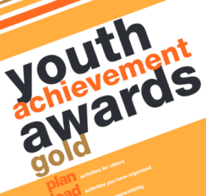 A close-up image of the front page of the Youth Achievement Awards - Gold Award booklet.