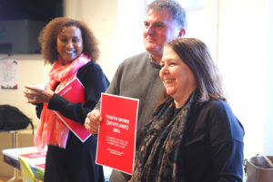Michele Meehan of Youth Scotland and Willie Barr of Citadel Youth Centre pose with a copy of the new Youth Work (Scotland) Bill