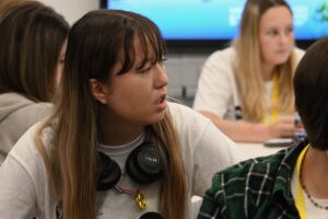 Alona listens during a workshop
