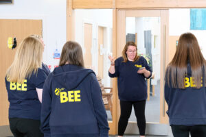 Debbie briefs her team of young leaders before their latest club gets going